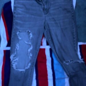 grey ripped jeans